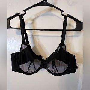 Unlined bra with underwire, see through cups